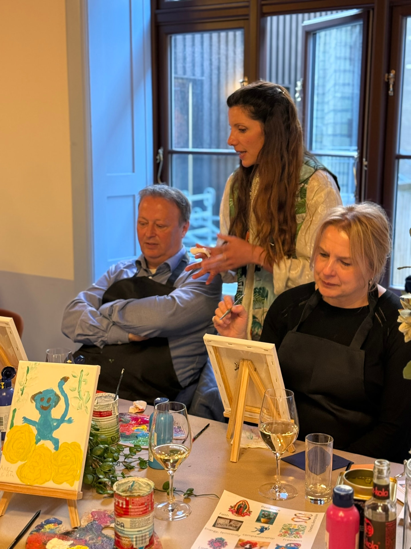 Guidance at every easel — a workshop in progress